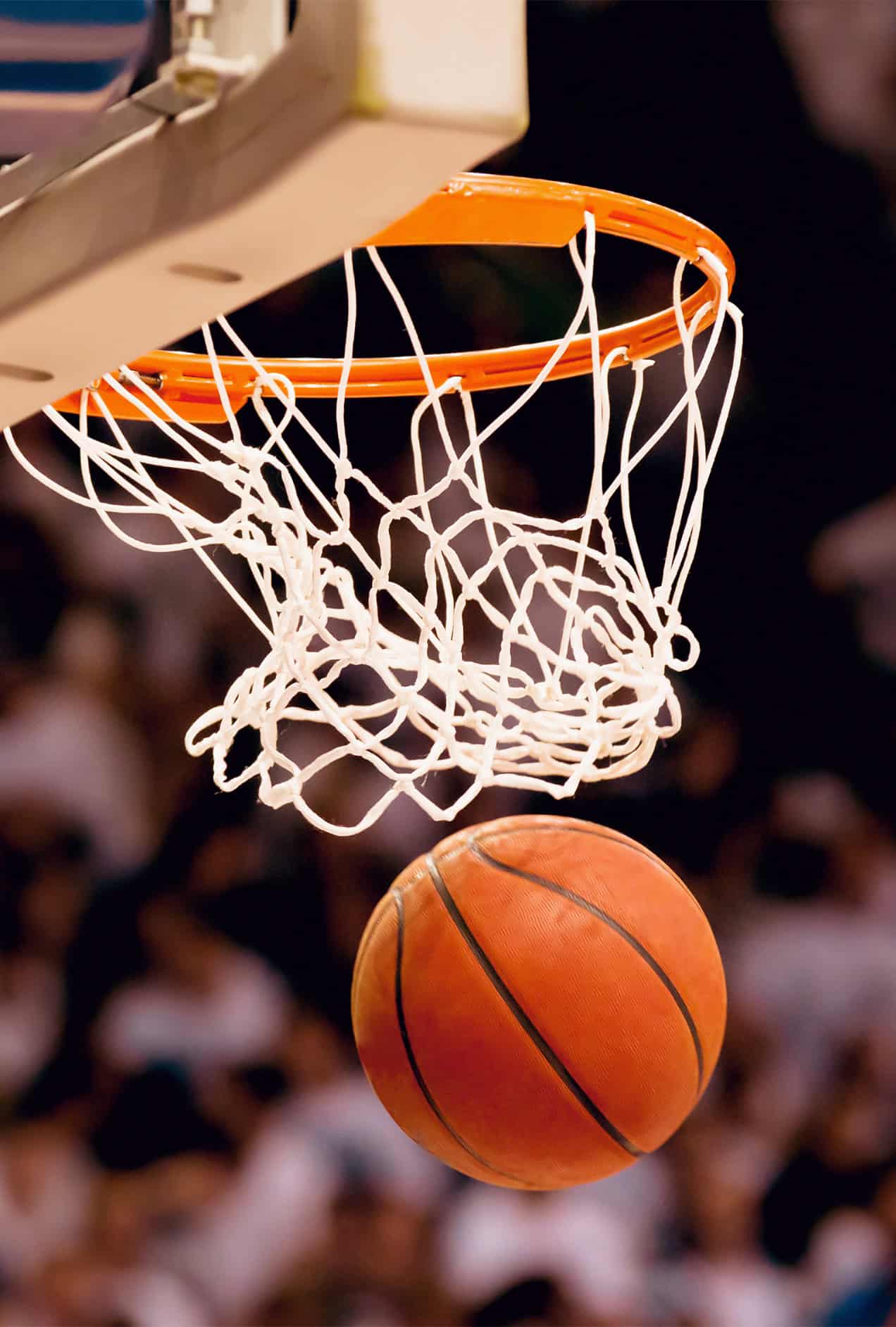 Scoring the winning points at a basketball game