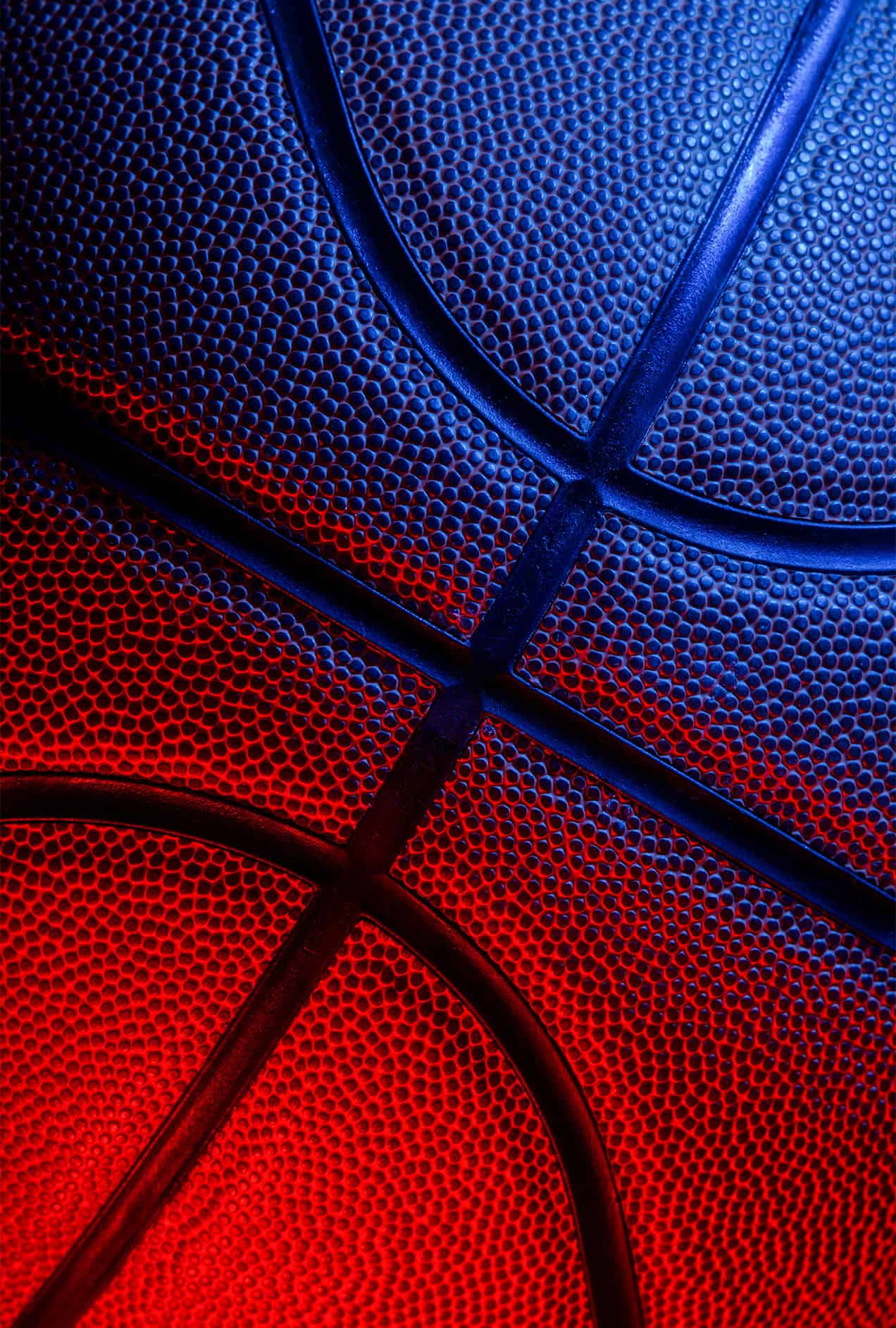 Closeup detail of basketball ball texture background.